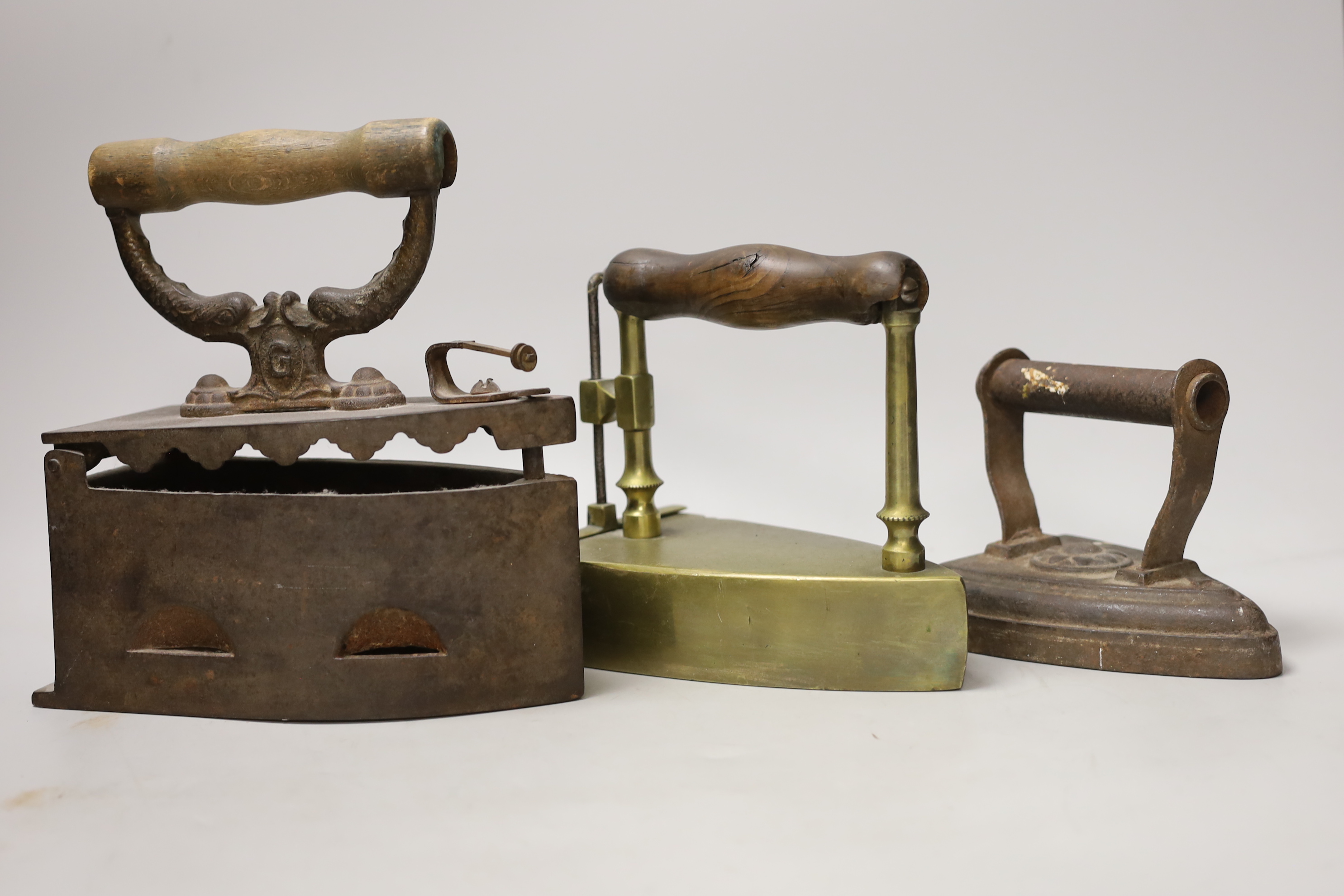 Three 19th century irons, tallest 23cms high